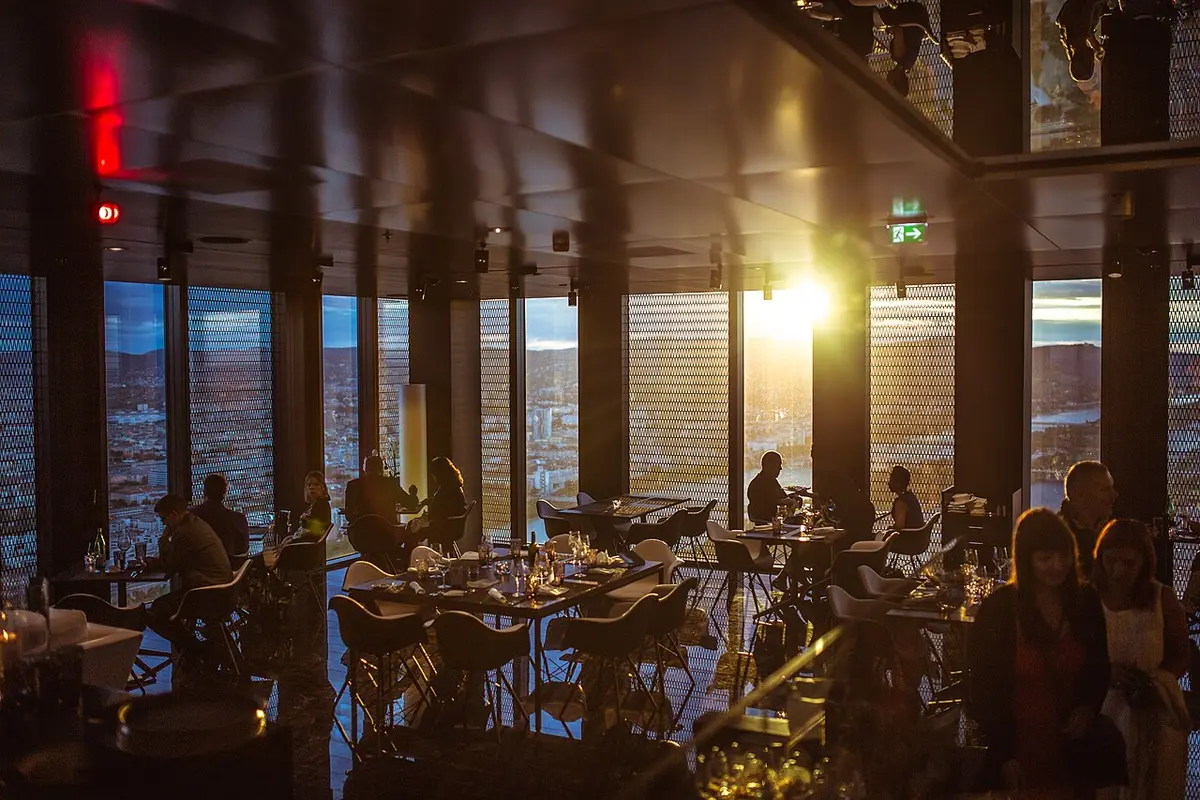 A dining room filling up at dusk